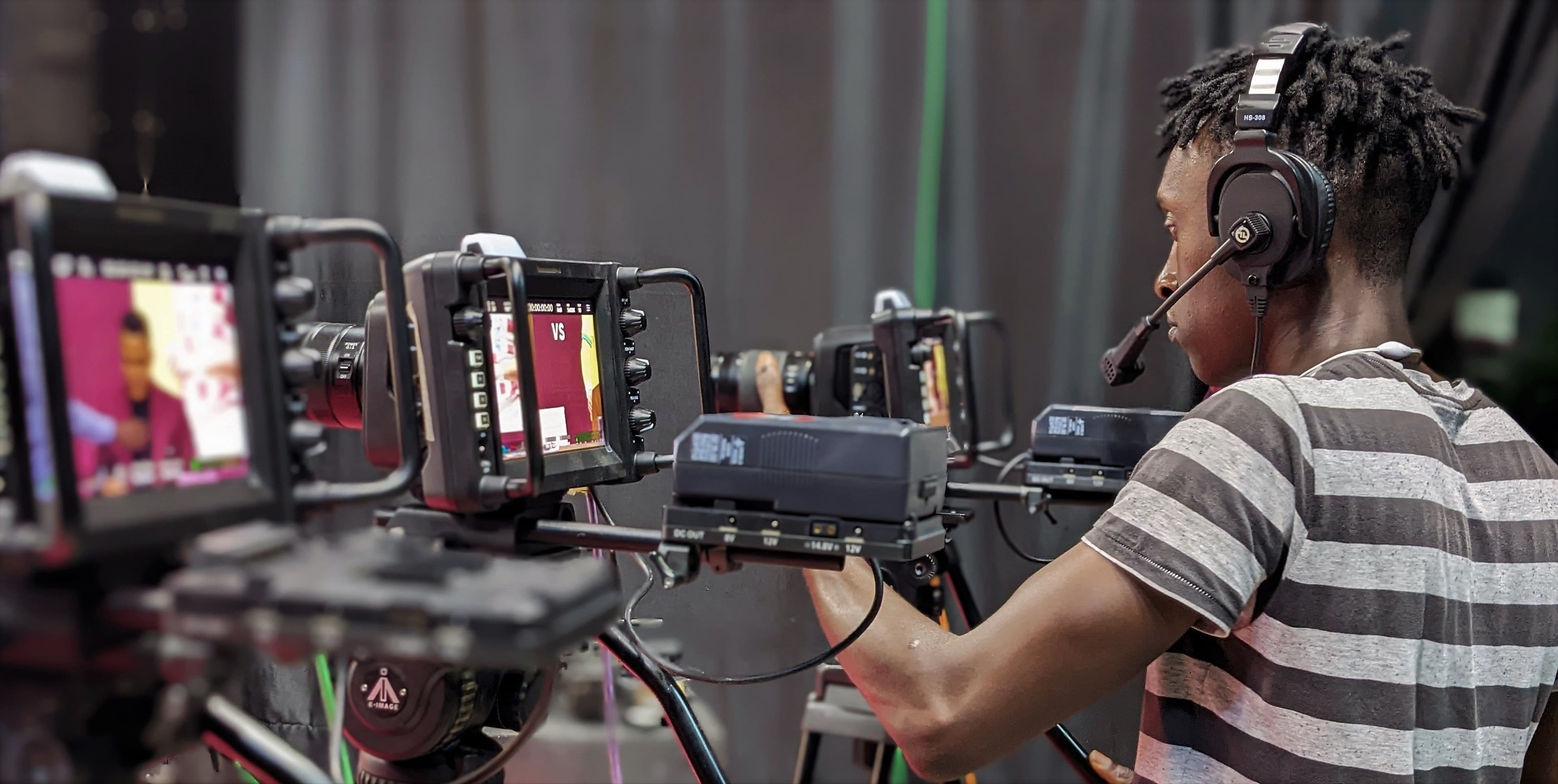 Camera operator working in a broadcast production environment